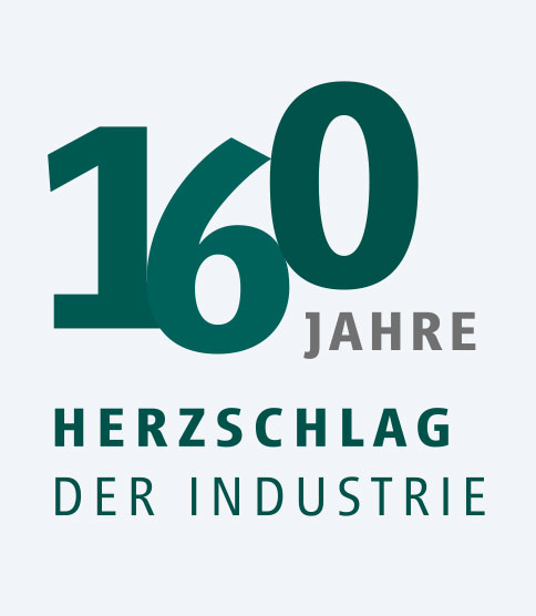 <h3><strong>160 ans : le pouls de l'industrie</strong></h3> Logo marking 160 years anniversary with the tagline "Herzschlag der Industrie" (Heartbeat of Industry)